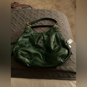 Green shiny Coach bag